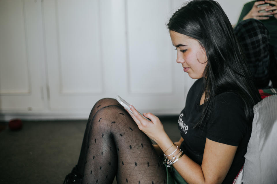 Teenage girl using social media. (Getty Images)