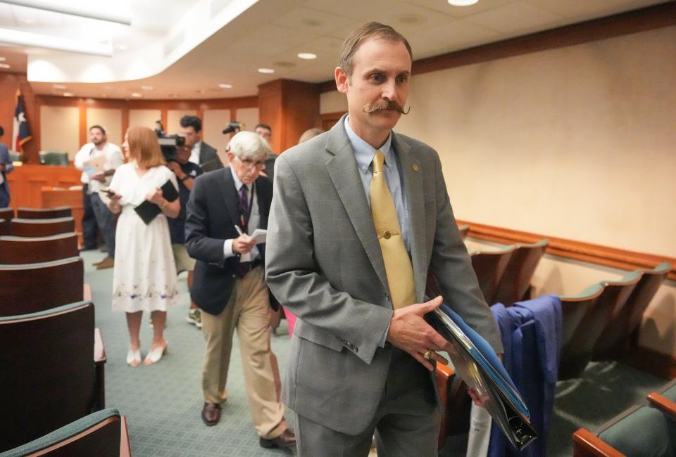 Rep. Andrew Murr, R - Junction, Chair of the House General Investigating Committee, walks away after recommending that the committee adopt the articles of impeachment against Attorney General Ken Paxton at the Capitol on Thursday May 25, 2023.