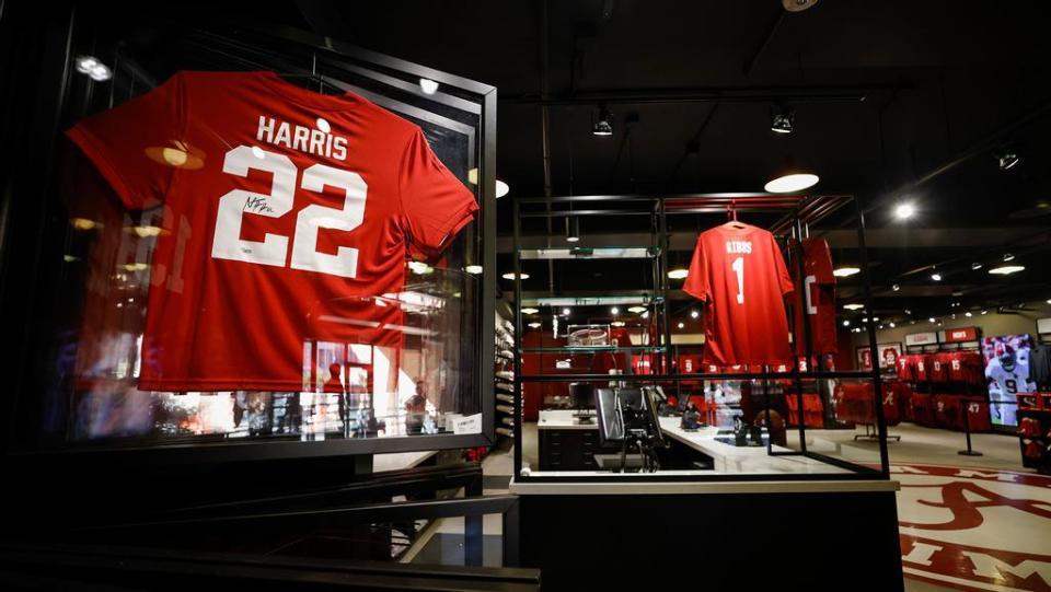 The Authentic opened at Bryant-Denny Stadium last October, offering officially licensed Crimson Tide apparel and memorabilia, including student-athlete NIL merchandise, from jerseys and shirts to headgear, trading cards and more.