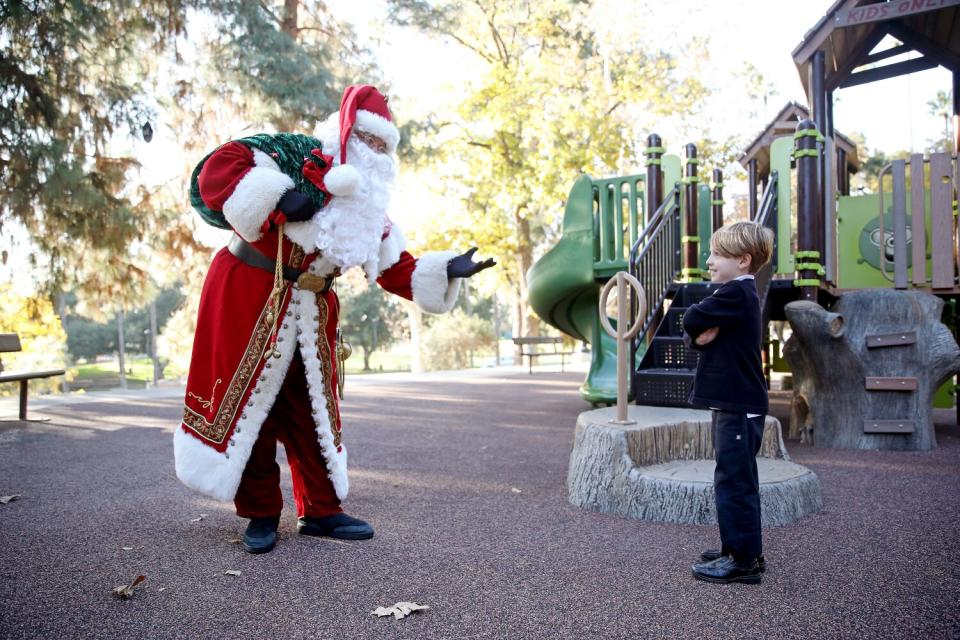 Fackrell greets Bowie van Grunsven, 6, at Brand Park.