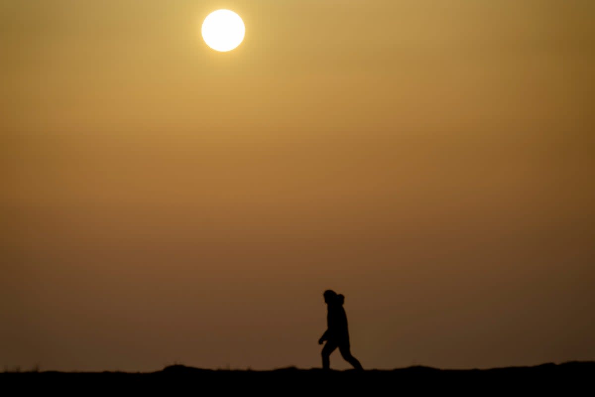 The sun rises amidst clouds of dust coming from the Sahara in Koge, Denmark, on February 23, 2021 (Ritzau Scanpix/AFP via Getty Ima)