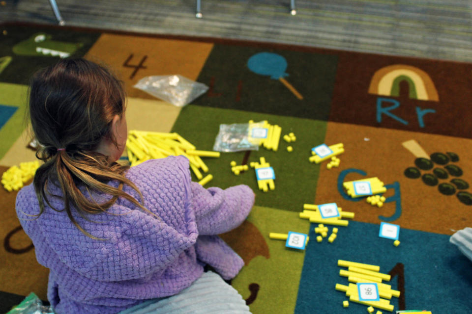 A rising first grader creates numbers using 