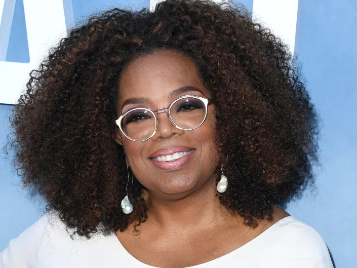 Oprah Winfrey walking the red carpet of the premiere of "David Makes Man" in 2019.