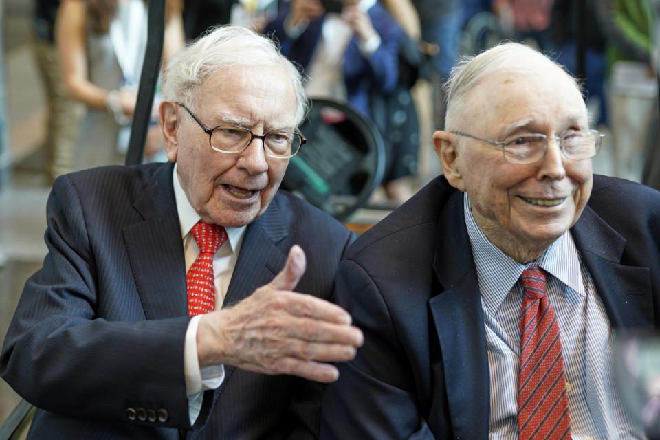 Berkshire Hathaway Chairman and CEO Warren Buffett, left, and Vice Chairman Charlie Munger, briefly chat with reporters Friday, May 3, 2019, one day before Berkshire Hathaway's annual shareholders meeting. An estimated 40,000 people are expected in town for the event, where Buffett and Munger preside over the meeting and spend hours answering questions. (AP Photo/Nati Harnik)