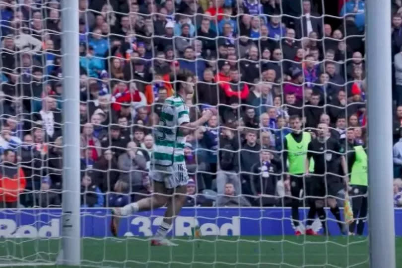 A glass bottle can be spotted near the feet of Matt O'Riley as he celebrates scoring a penalty for Celtic