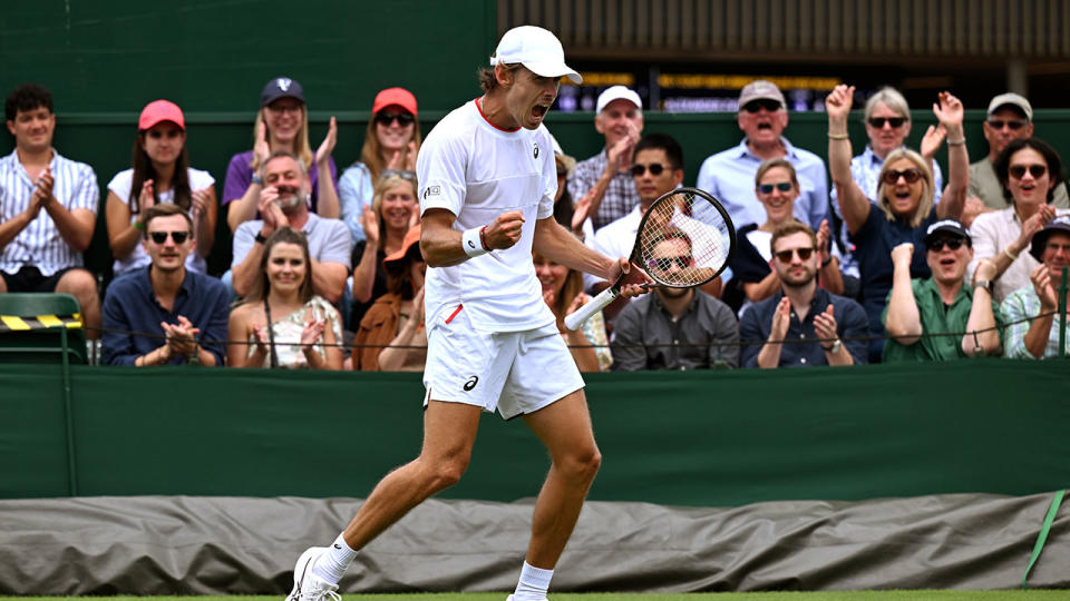 Alex de Minaur roars after winning his first round match at Wimbledon. Pic: Getty