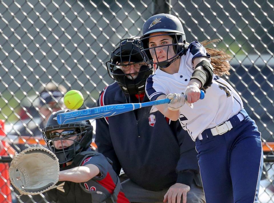 Tallmadge batter Marley Queen connects with a pitch during the first inning of a softball game against Crestwood on Tuesday, March 30, 2021, in Tallmadge.
