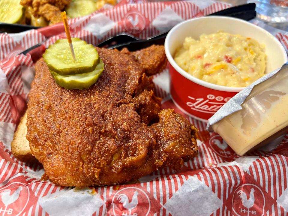 Hattie B's hot chicken leg and mac and cheese at the midtown location on Feb. 20, 2024