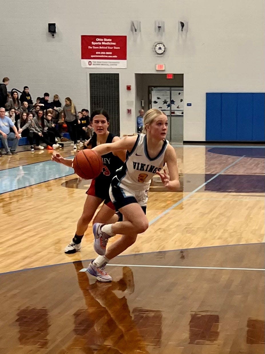 River Valley's Lexie Hecker drives to the basket against Bishop Hartley during a Division II girls basketball district semifinal game at Olentangy Berlin Wednesday night.