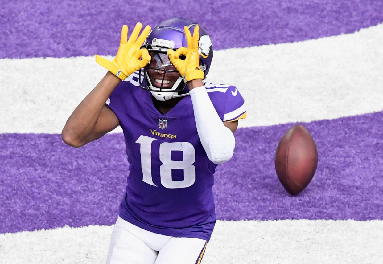 MINNEAPOLIS, MINNESOTA - SEPTEMBER 27: Justin Jefferson #18 of the Minnesota Vikings celebrates a touchdown against the Tennessee Titans during the third quarter of the game at U.S. Bank Stadium on September 27, 2020 in Minneapolis, Minnesota. (Photo by Hannah Foslien/Getty Images)