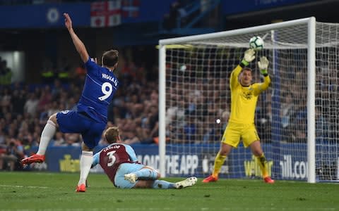 Gonzalo Higuain of Chelsea scores his team's second goal, smashing it into the roof of the net from a narrow angle - Credit: Getty