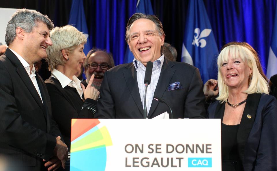 CAQ leader Legault smiles during a news conference after Quebec's Premier Marois called an election in Quebec City