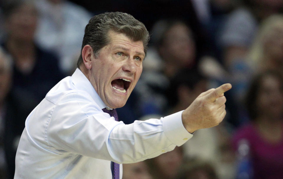 FILE - In this March 30, 2013 file photo, Connecticut head coach Geno Auriemma calls to his players during the first half of a women's NCAA college regional semifinal basketball game against Maryland in Bridgeport, Conn. Notre Dame and Connecticut are on an unprecedented collision course to meet in the national championship game. First, the two unbeaten teams will have to win their national semifinal games before the historic matchup can take place. (AP Photo/Charles Krupa, File)