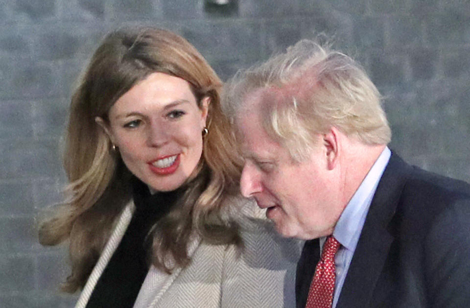 File photo dated 13/12/2019 of Prime Minister Boris Johnson with partner Carrie Symonds, they have announced that they are expecting a baby in the early summer and that they have got engaged.