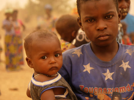 Villagers are seen following the March 23 attack by militiamen that killed about 160 Fulani people, in Ogossagou Village, Mali, March 31, 2019 in this handout picture obtained April 18, 2019. ICRC via REUTERS