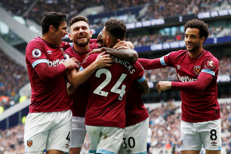 Soccer Football - Premier League - Tottenham Hotspur v West Ham United - Tottenham Hotspur Stadium, London, Britain - April 27, 2019 West Ham's Michail Antonio celebrates scoring their first goal with Fabian Balbuena, Robert Snodgrass and Felipe Anderson Action Images via Reuters/Paul Childs