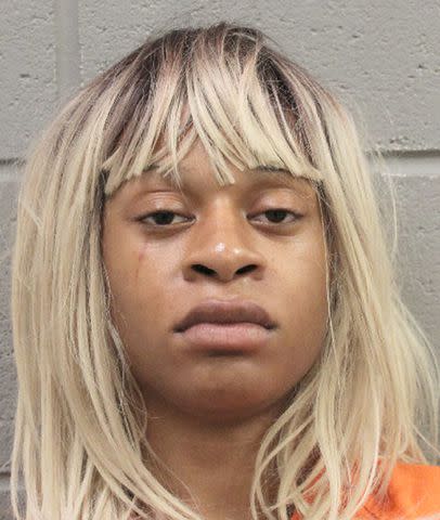 <p>Houston Police Department/Facebook </p> Karon Fisher's booking photo