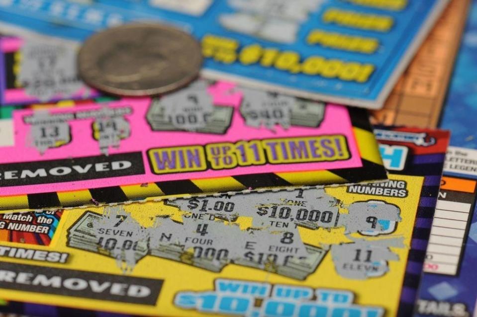 Massachusetts Lottery instant tickets are scratched off with a quarter.