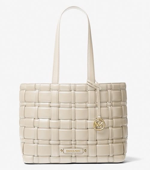 Michael Kors has tons of pretty, colorful handbags on sale for 25% off today