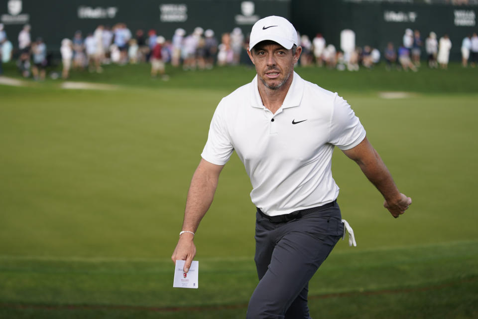 Rory McIlroy, of Northern Ireland, walks off after completing the first round of the Wells Fargo Championship golf tournament at Quail Hollow on Thursday, May 9, 2024, in Charlotte, N.C. (AP Photo/Erik Verduzco)