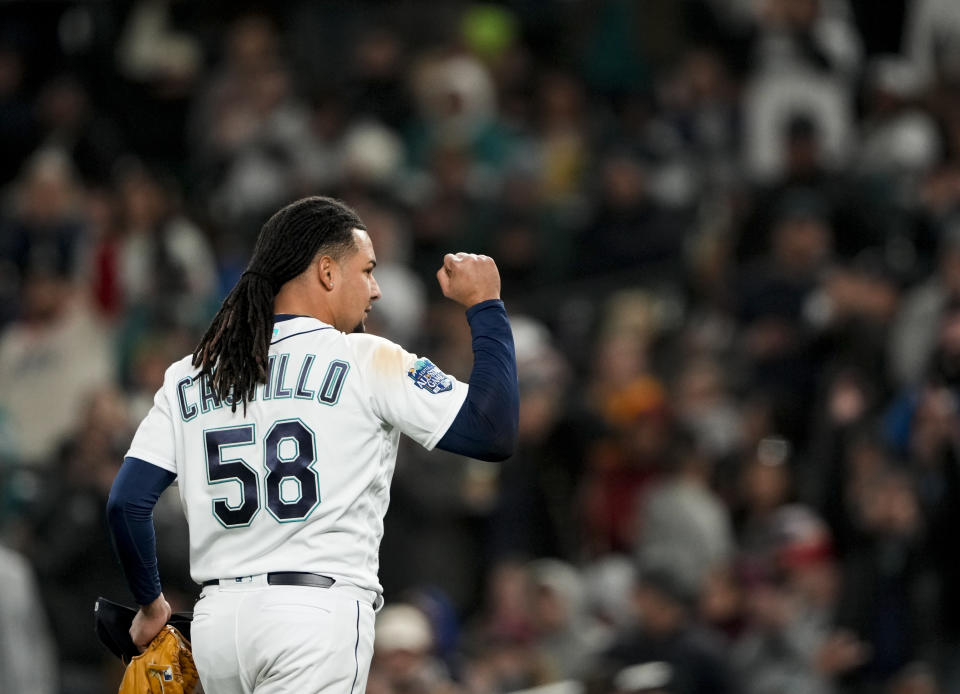 Seattle Mariners starting pitcher Luis Castillo reacts after being removed during the sixth inning without having given up a run to the Los Angeles Angels in a baseball game Tuesday, April 4, 2023, in Seattle. (AP Photo/Lindsey Wasson)