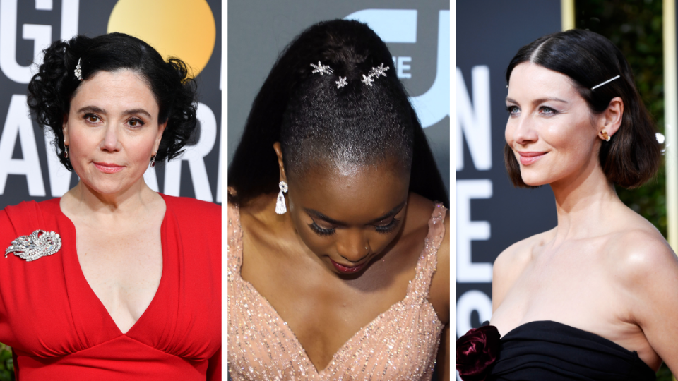 From left: Alex Borstein, Kiki Layne and Caitriona Balfe wearing hair clips on the red carpet. (Getty Images)