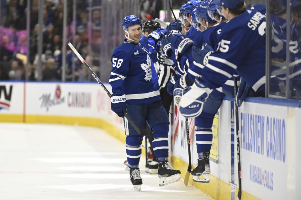 Toronto Maple Leafs left winger Michael Bunting (58) celebrates his goal against the Columbus Blue Jackets during the first period of an NHL hockey game Saturday, Feb. 11, 2023, in Toronto. (Jon Blacker/The Canadian Press via AP)