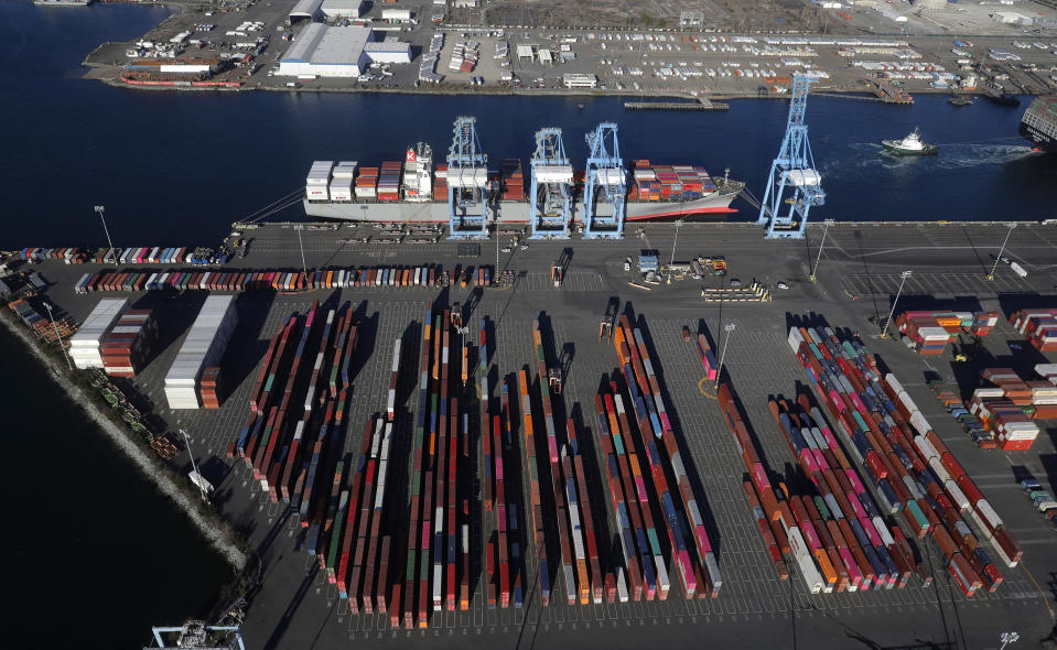 FILE - In this March 5, 2019, file photo, cargo containers are staged near cranes at the Port of Tacoma, in Tacoma, Wash. Most economists were already worried that the odds of a recession are rising, and most of the worries stem from the U.S.-China trade war. (AP Photo/Ted S. Warren)