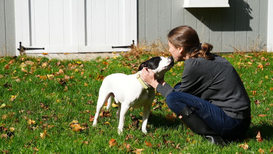 Wish plays with his owner outside his home in New Jersey. - Isabelle Chapman/CNN