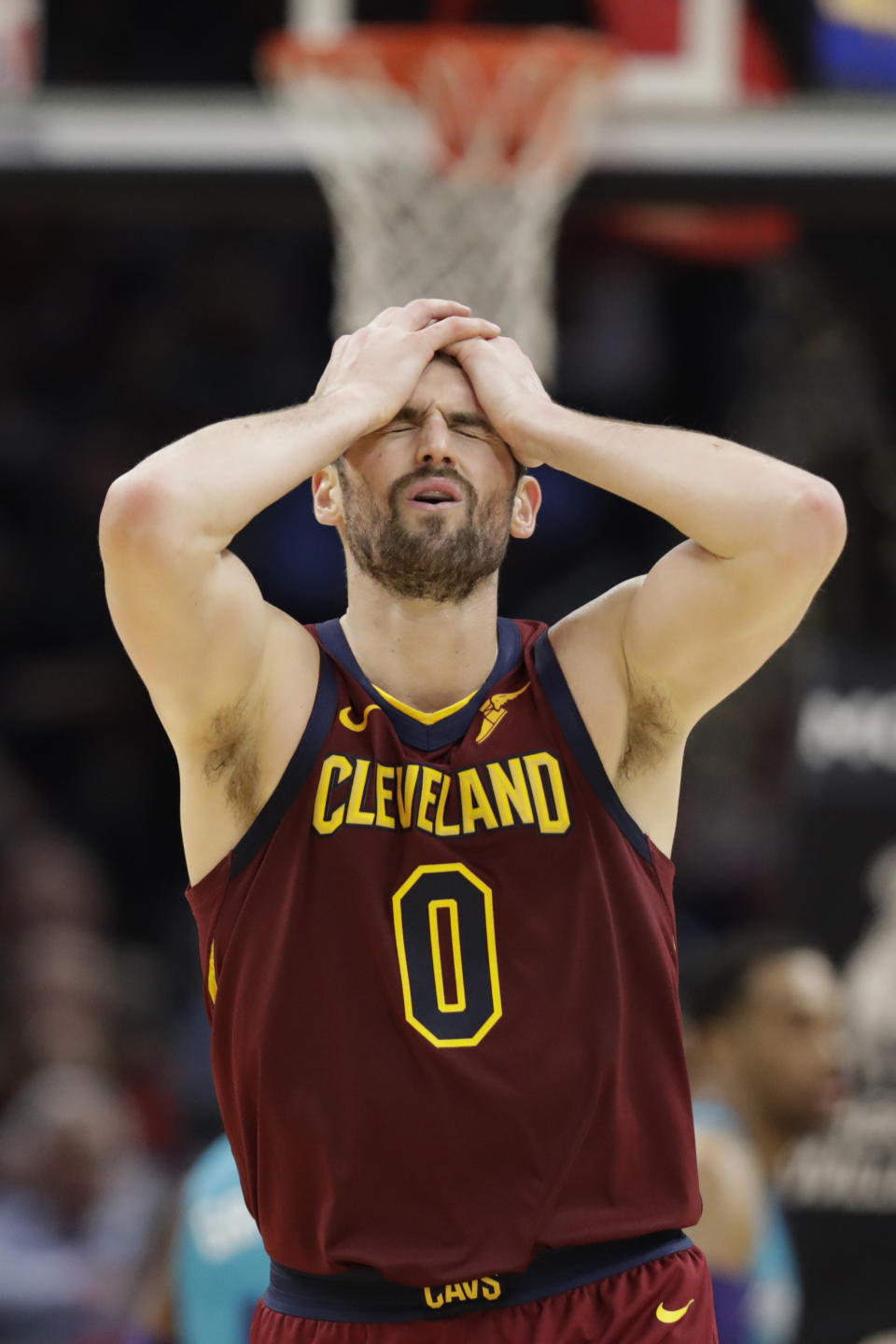 Cleveland Cavaliers' Kevin Love reacts after missing a three-point basket late in the second half of an NBA basketball game against the Charlotte Hornets, Thursday, Jan. 2, 2020, in Cleveland. (AP Photo/Tony Dejak)