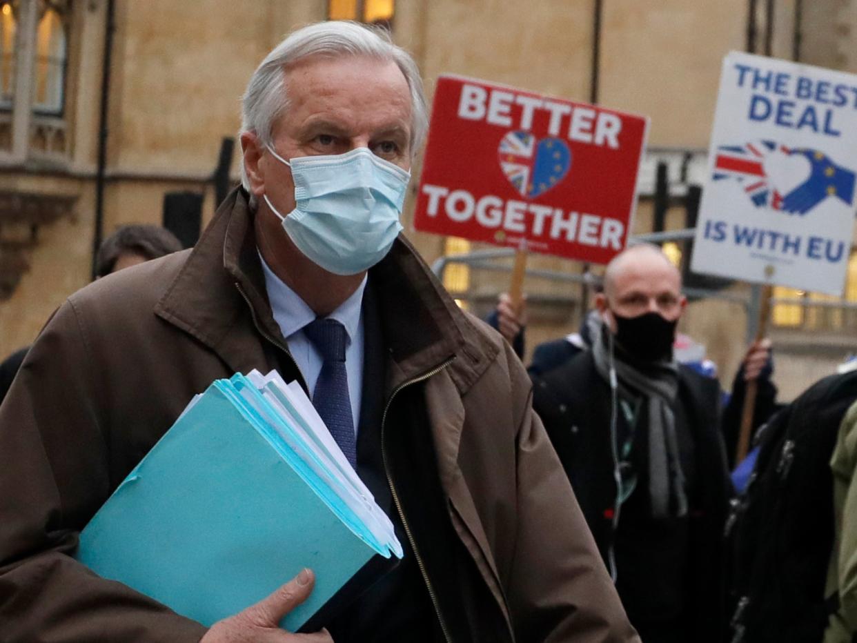 Michel Barnier passes pro-EU demonstrators near ‘make or break’ talks in London (AP Photo/Kirsty Wigglesworth)