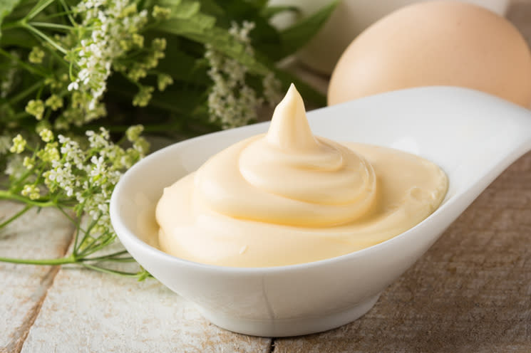 <div class="caption-credit">Photo by: Shutterstock</div><div class="caption-title">Mayonnaise</div>When it comes to removing water rings from wooden furniture, Jonathan Burden, owner of the eponymous furniture restoration company, swears by mayonnaise. Wrap a rag around your finger, then "put a little bit of Hellmann's on top of that, and gently massage it into the ring. Ninety-nine times out of a hundred, it will reverse that white ring." For particular stubborn stains, let the mayo sit for two hours, reapplying intermittently. <br>