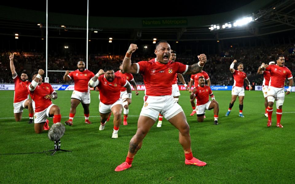 Sonatane Takulua of Tonga leads the performance of the Sipi Tau