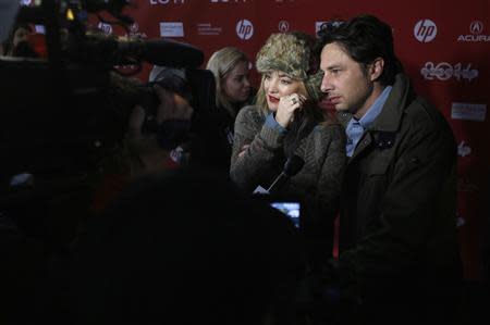 Actors Kate Hudson and Zach Braff (R) attend the premiere of the film "Wish I Was Here" at the Sundance Film Festival in Park City, Utah, January 18, 2014. REUTERS/Jim Urquhart
