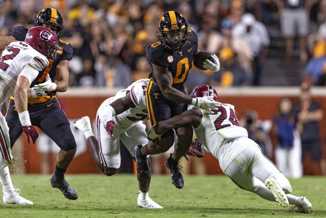 Milton, sack-happy defense lead No. 21 Tennessee to 41-20 revenge victory  over South Carolina