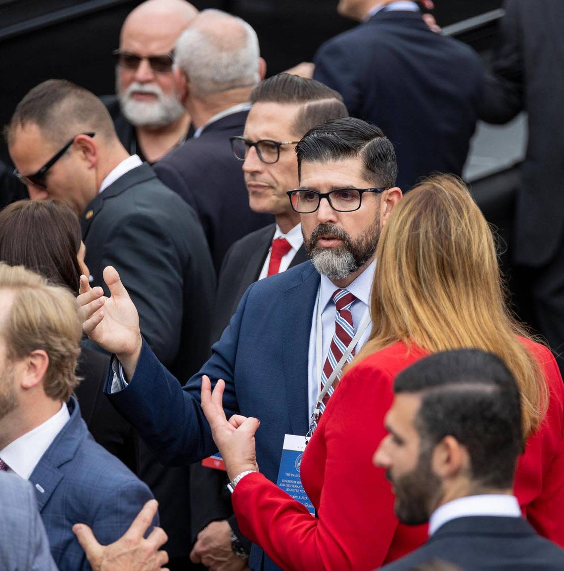 Florida Education Commissioner Manny Diaz Jr., center, talks with Miami Dade College President Madeline Pumariega as they attend Gov. Ron DeSantis’ inauguration ceremony on Tuesday, Jan. 3, 2023, in Tallahassee, Fla.