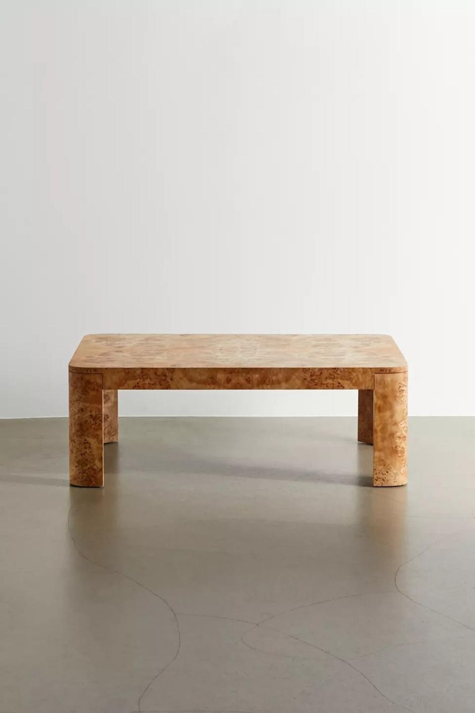 <p><a href="https://go.redirectingat.com?id=74968X1596630&url=https%3A%2F%2Fwww.urbanoutfitters.com%2Fshop%2Fcora-burl-wood-veneer-coffee-table%3Fcolor%3D023%26type%3DREGULAR%26size%3DS%26quantity%3D1&sref=https%3A%2F%2F" rel="nofollow noopener" target="_blank" data-ylk="slk:Shop Now;elm:context_link;itc:0;sec:content-canvas" class="link ">Shop Now</a></p><p>Cora Coffee Table</p><p>urbanoutfitters.com</p><p>$199.95</p>