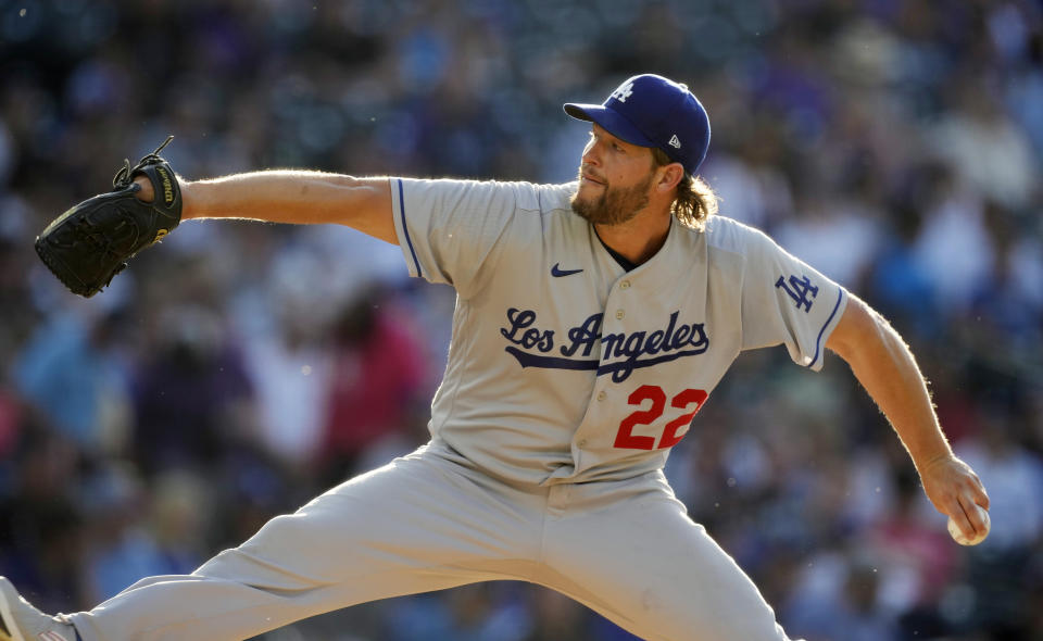 Los Angeles Dodgers starting pitcher Clayton Kershaw works against the Colorado Rockies in the first inning of a baseball game Tuesday, June 27, 2023, in Denver. (AP Photo/David Zalubowski)