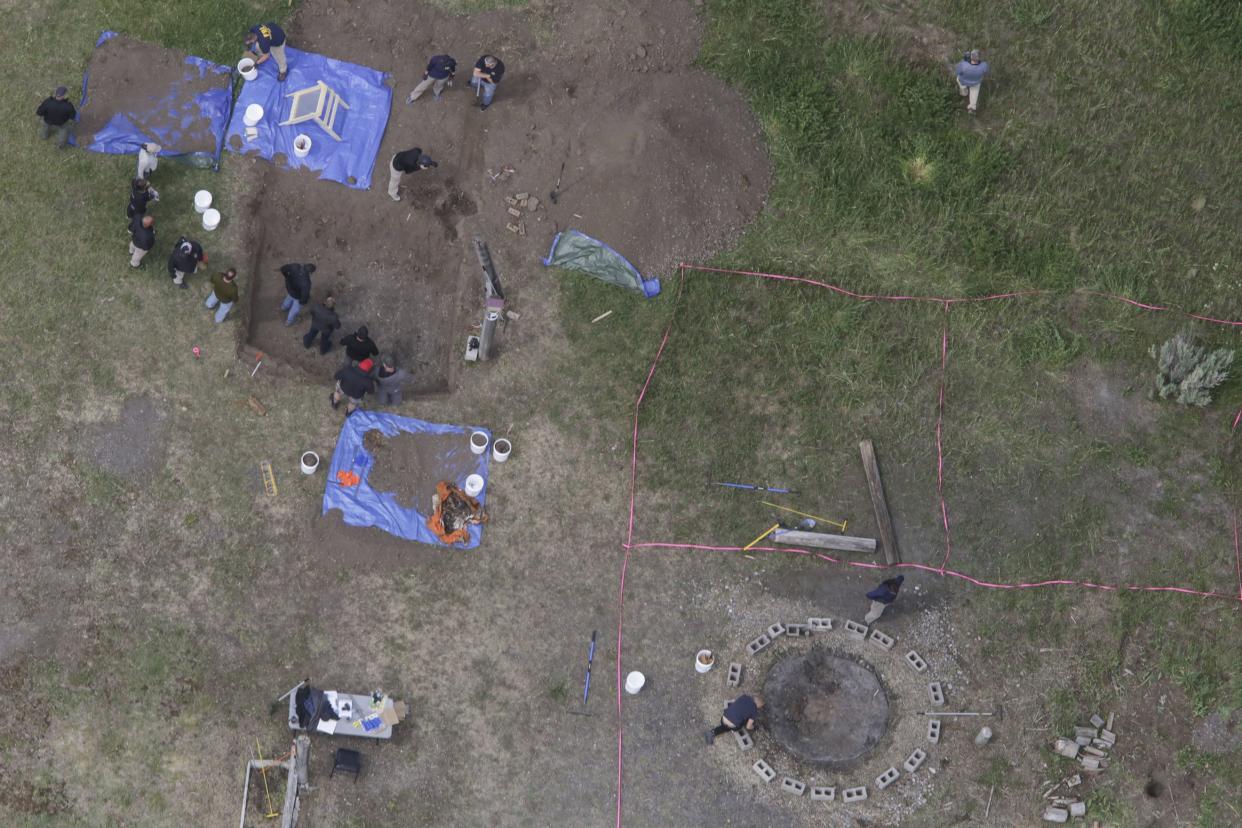 In this aerial photo, investigators search for human remains at Chad Daybell's residence on Tuesday, June 9, 2020, in Salem, Idaho.