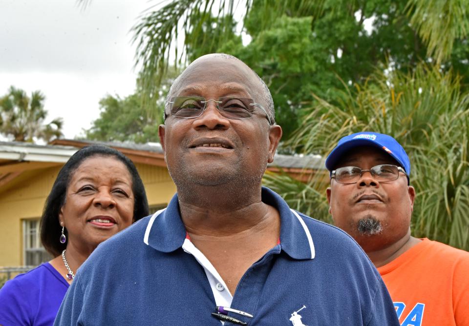 Newtown resident Johnny Hunter Sr., in middle, with his son Johnny Hunter Jr. and longtime Tempo News reporter Cynthia Howard, in 2020.