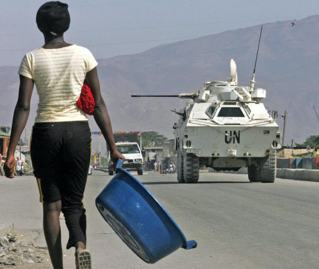 Many Haitians are wary of International forces. <a href="https://www.gettyimages.com/detail/news-photo/port-au-prince-haiti-a-tank-from-the-un-peacekeeping-force-news-photo/56738051?adppopup=true" rel="nofollow noopener" target="_blank" data-ylk="slk:Jaime Razuri/AFP via Getty Images);elm:context_link;itc:0;sec:content-canvas" class="link ">Jaime Razuri/AFP via Getty Images)</a>