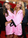 <p>Blonde and brunette beauties Lily Aldridge and Erin Heatherton strike a pose in matching pink, silk gowns.</p>