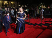 Egyptian actress Nadia Elgendi walks on the red carpet during the opening of the first edition of the Red Sea International Film Festival, in Jiddah, Saudi Arabia, late Monday, Dec. 6, 2021. Saudi Arabia is holding its first ever film festival three and-a-half years after the first movie premiered in cinemas in the kingdom. The festival featured a red carpet with women in floor-length ball gowns, a stark departure from past years when females had to wear the long flowing robe known as the abaya in public. (AP Photo/Amr Nabil)