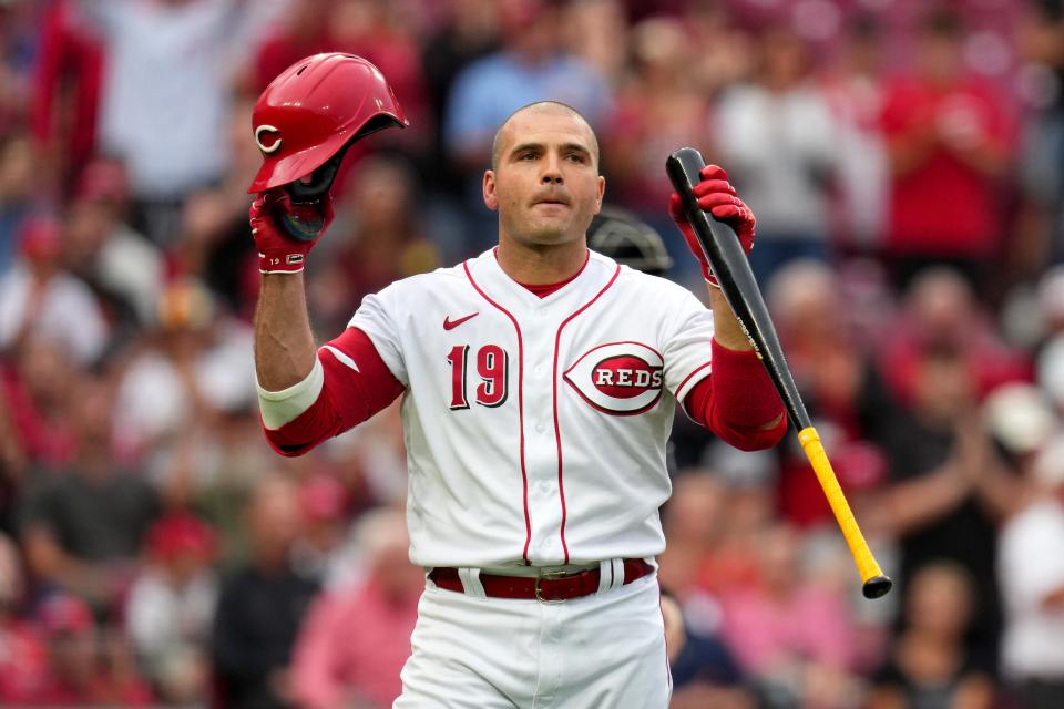 Cincinnati Reds first baseman Joey Votto (19) is recognized by the crowd before his first at-bat of the season in the second inning of a baseball game between the Colorado Rockies and the Cincinnati Reds, Monday, June 19, 2023, at Great American Ball Park in Cincinnati. 