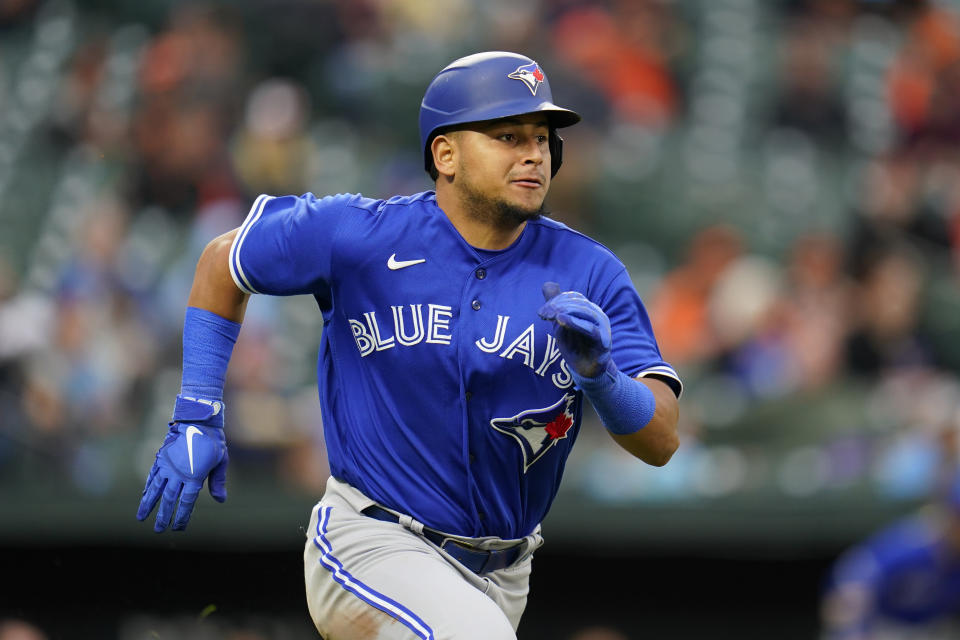 FILE -Toronto Blue Jays' Gabriel Moreno runs the bases while collecting a single against the Baltimore Orioles during the seventh inning of the second game of a baseball doubleheader, Wednesday, Oct. 5, 2022, in Baltimore. The Arizona Diamondbacks acquired highly regarded catching prospect Gabriel Moreno and veteran outfielder Lourdes Gurriel Jr. on Friday, Dec. 23, 2022, sending slugger Daulton Varsho to the Toronto Blue Jays. (AP Photo/Julio Cortez, File)