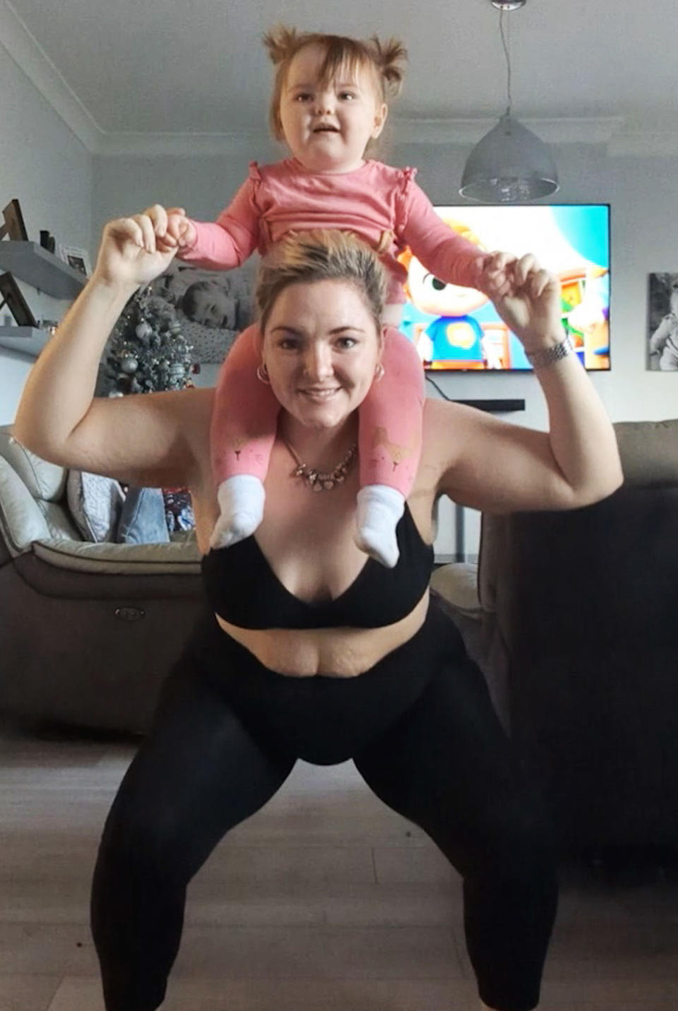 Morrison says she loved incorporating her children into her home workouts. (Cassie Morrison/Caters)