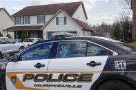 A Murrysville Police vehicle is seen at the family home of a suspect after a series of knife attacks at at Franklin Regional High School in Murrysville, Pennsylvania April 9, 2014. REUTERS/Shannon Stapleton