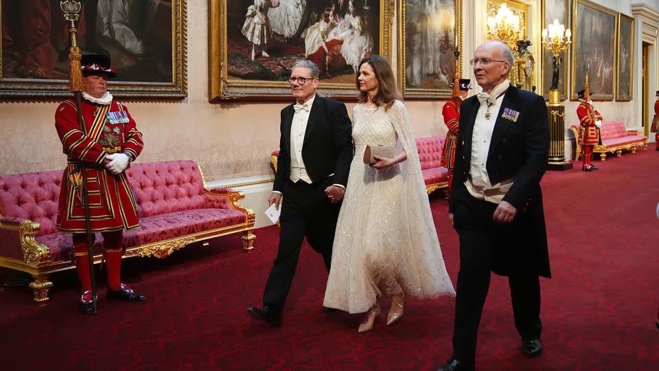 The couple make their way to the State Banquet for Emperor Naruhito and his wife Empress Masako of Japan at Buckingham Palace, London, in June. - Aaron Chown/PA