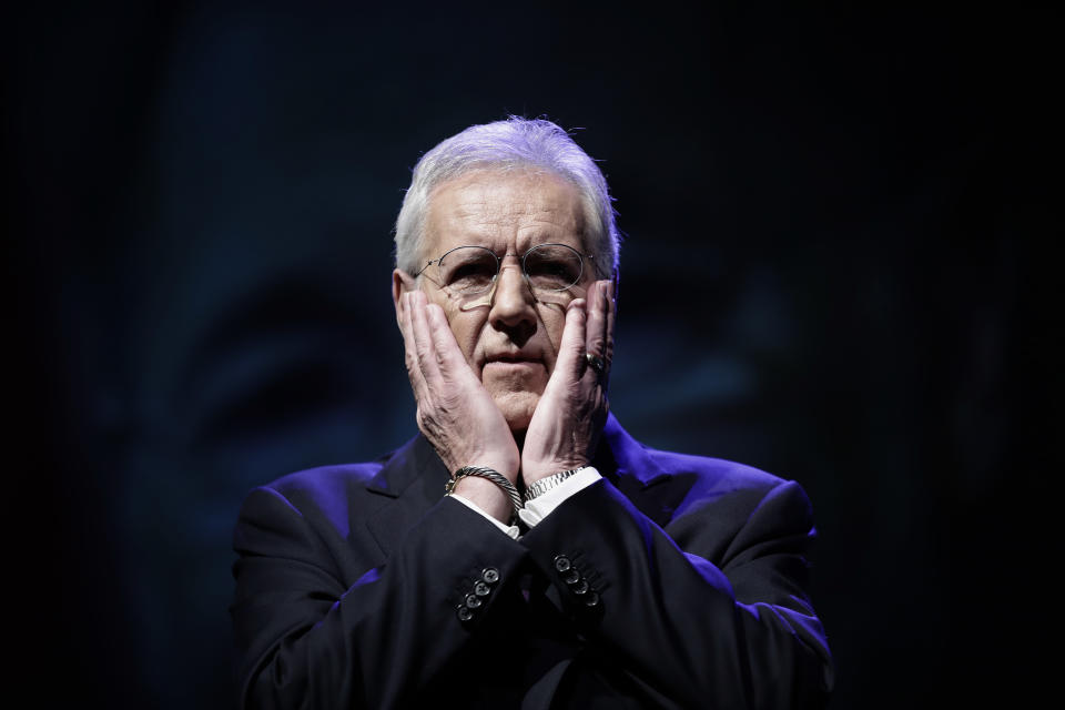 In this Oct. 1, 2018, photo, moderator Alex Trebek speaks during a gubernatorial debate between Democratic Gov. Tom Wolf and Republican Scott Wagner in Hershey, Pa. Jeopardy!" host Trebek says he has been diagnosed with advanced -four pancreatic cancer. In a video posted online Wednesday, March 6, 2019, Trebek said he was announcing his illness directly to "Jeopardy!" fans in keeping with his long-time policy of being "open and transparent." (AP Photo/Matt Rourke)