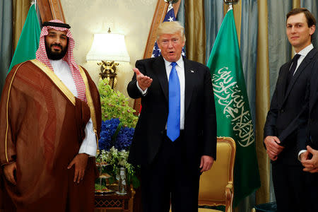 FILE PHOTO: U.S. President Donald Trump, flanked by White House senior advisor Jared Kushner, meets with Saudi Arabia's Deputy Crown Prince Mohammed bin Salman at the Ritz Carlton Hotel in Riyadh, Saudi Arabia May 20, 2017. REUTERS/Jonathan Ernst